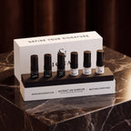 SIGNAR luxury Discovery Set box with six 5ml perfume tester vials displayed on a polished marble pedestal.