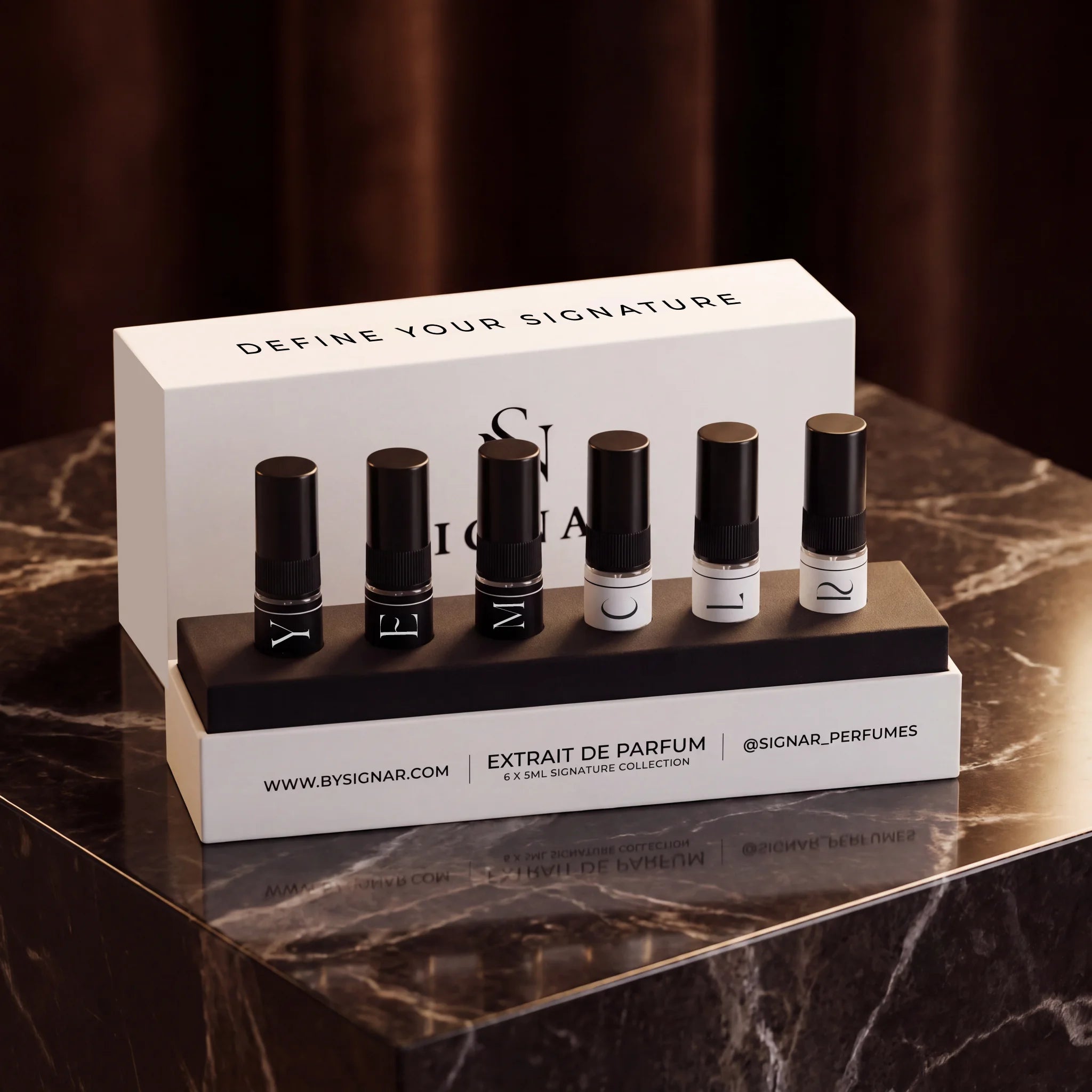 SIGNAR luxury Discovery Set box with six 5ml perfume tester vials displayed on a polished marble pedestal.