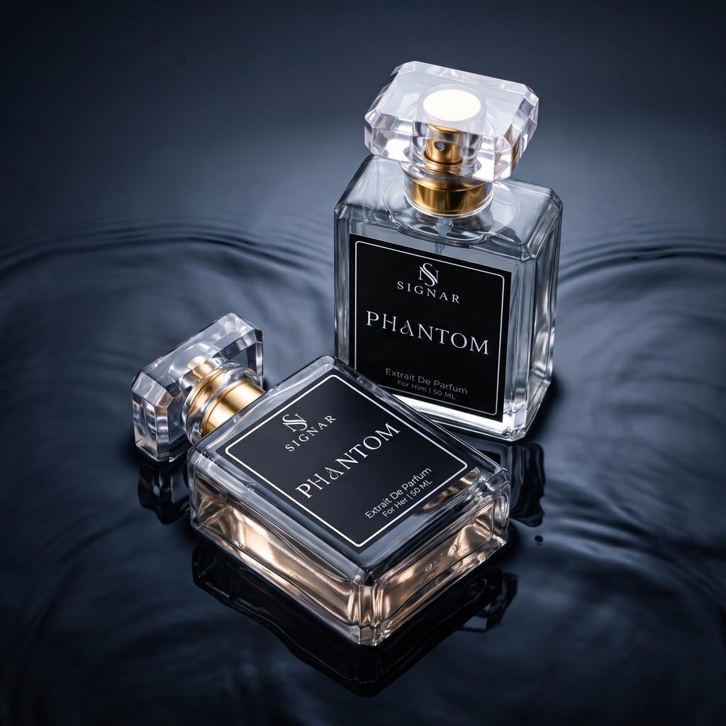 Two SIGNAR PHANTOM cologne bottles with clear glass bodies, black labels, and gold collars, arranged on a dark reflective surface with water ripples.