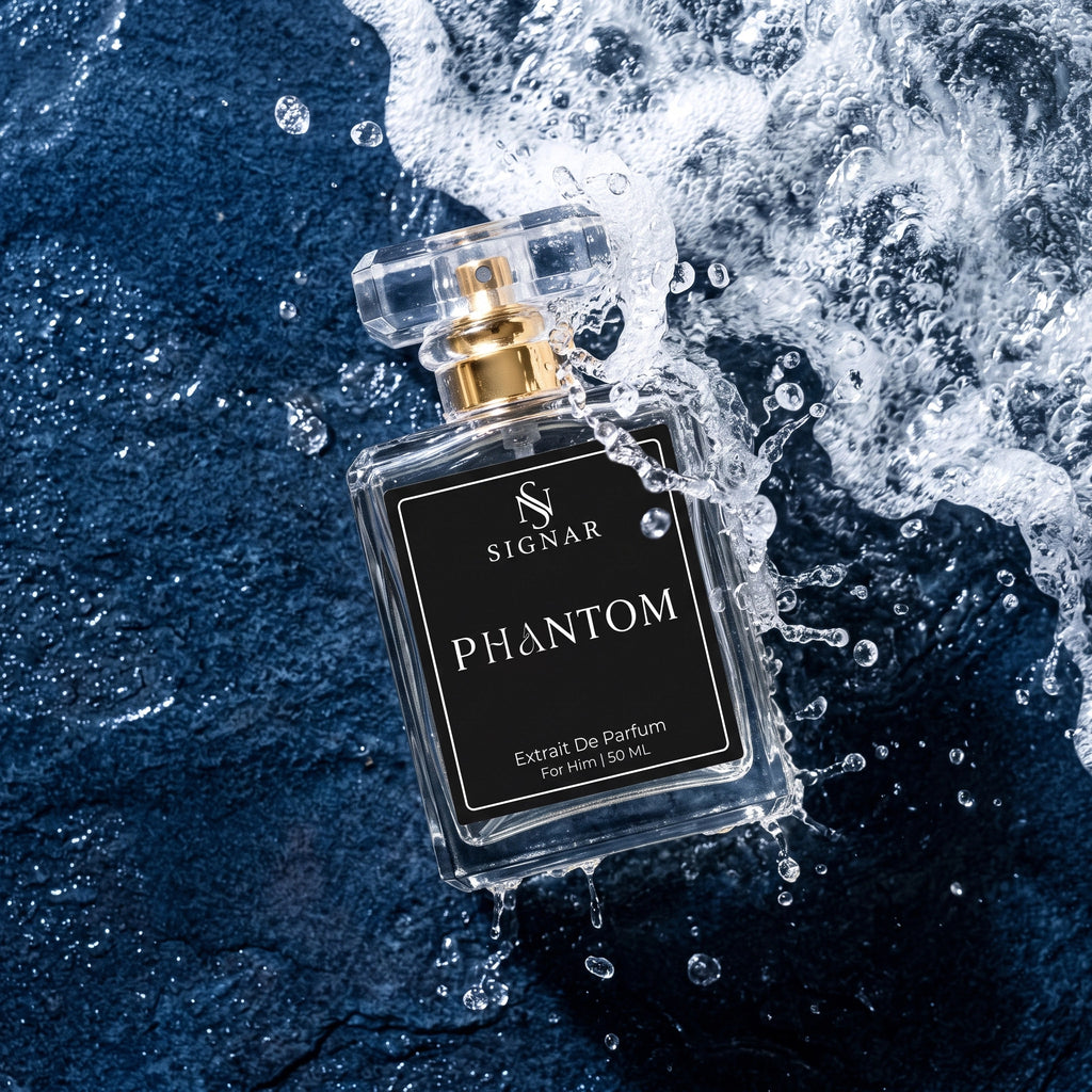 A clear glass perfume bottle labeled 'SIGNAR PHANTOM' with a gold spray top, floating in dramatic water spray against a dark blue textured background.