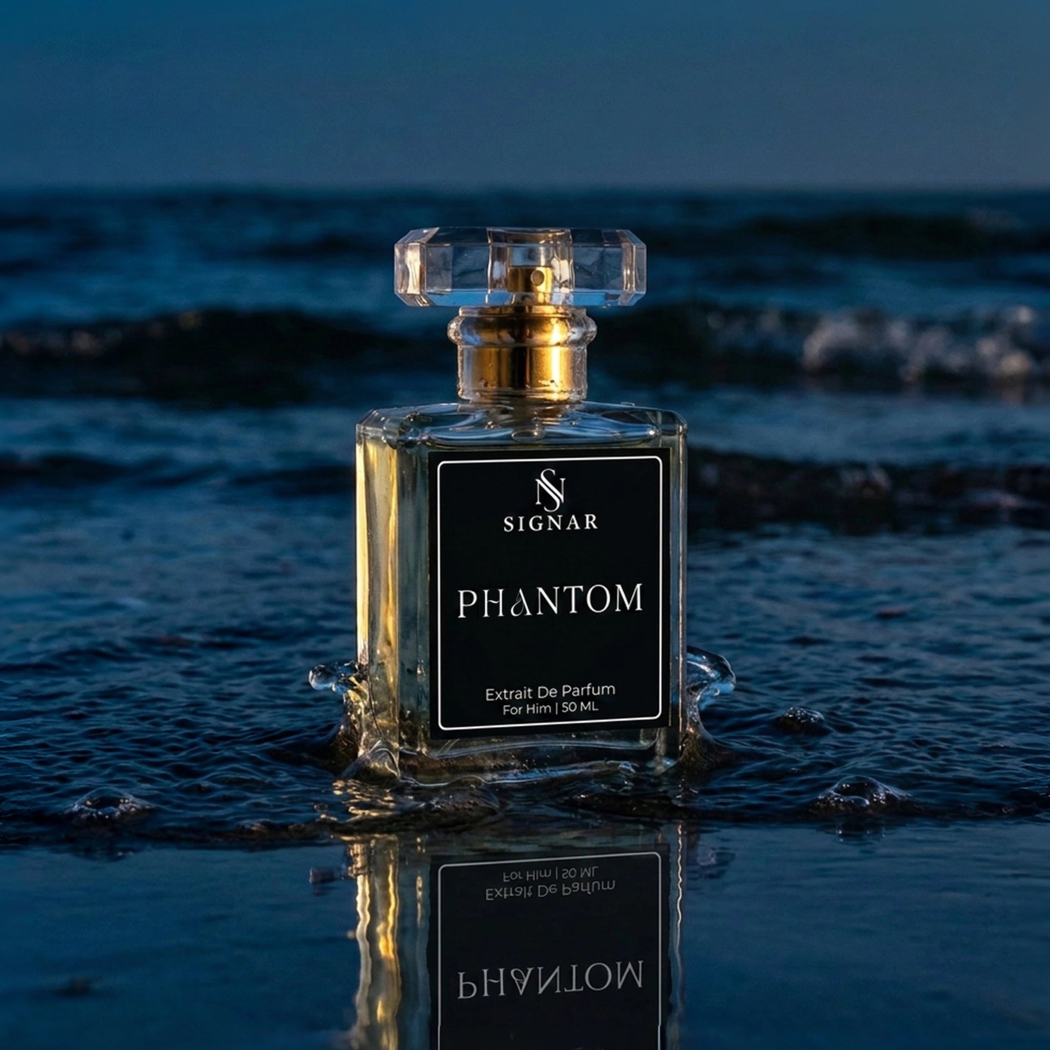 SIGNAR Phantom Extrait De Parfum 150 ml perfume bottle with a gold atomizer and clear cap, set in shallow ocean water with a reflection on the wet surface.